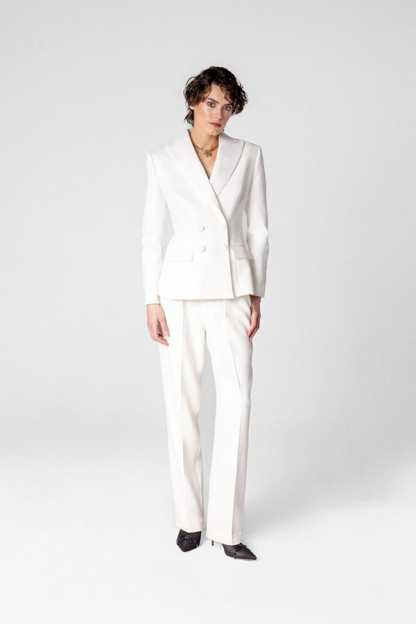 Double breasted women's blazer with peak lapels